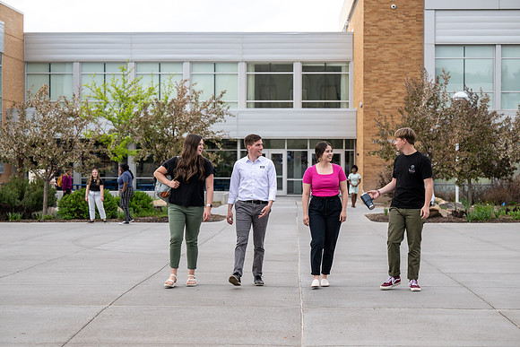 Student models for Admissions Viewbook cover options. May 2023