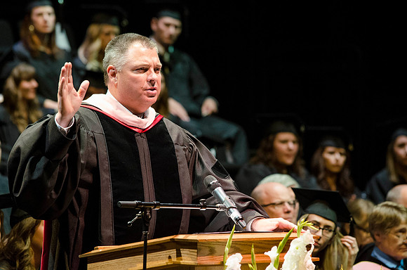 Kevin Brower, Dean of the College of Performing and Visual Arts, speaks to graduates.