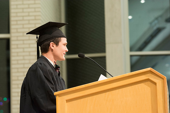 Rusty Denton giving a speech at the Convocation for the College of Physical Sciences