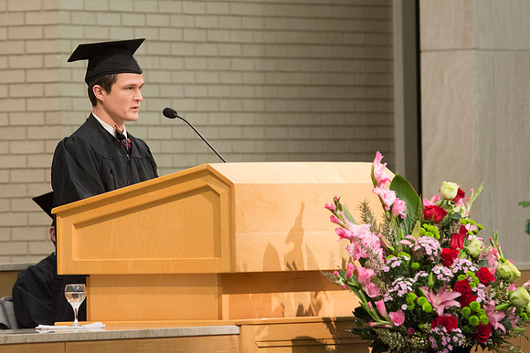 Rusty Denton giving a speech at the Convocation for the College of Physical Sciences