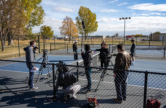Dinking around playing pickleball for the HR Wellness Video.
