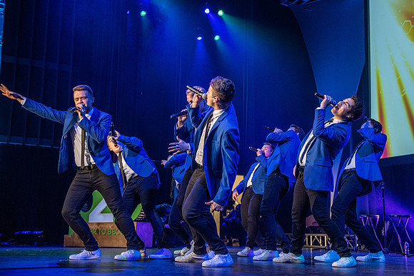 Vocal Point performs during Power to Become, held in the Hart Auditorium.