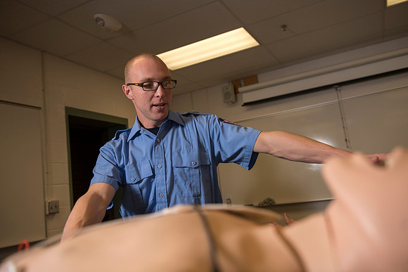 Cory Marriott and his peer pass off EMT requirements during lab held in the Clarke Building.