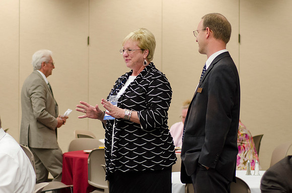 Online instructors gather for breakfast and instruction.