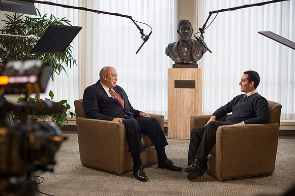President Wilkes chat's with video production student before President Gilbert arrives.