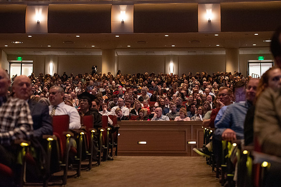 Student Graduates and Faculty meet in the I-Center for Commencement.