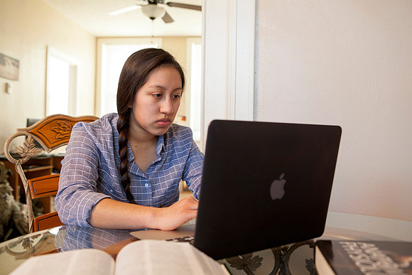 Tanya Rickenbach studies online at BYU-Idaho in her quiet apartment.