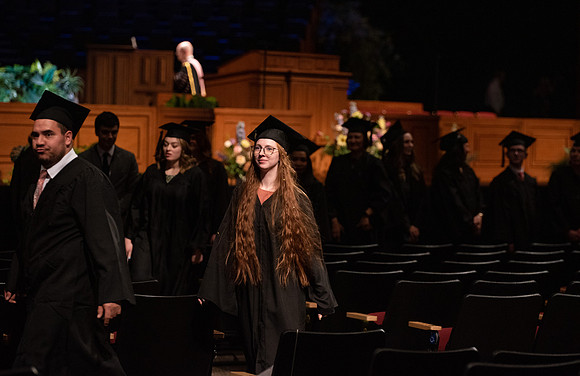 Student Graduates and Faculty meet in the I-Center for Commencement.