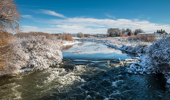 Winter scene of Teton River from bridge West of Rexburg on 3000 West.