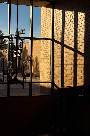 Shadows cast from the rising sun over campus.