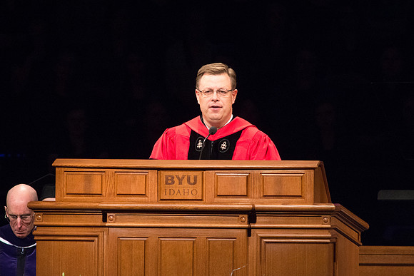 President Clark G. Gilbert conducting during Commencement