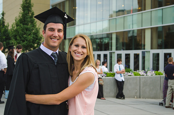 Students walking outside following the Commencement address