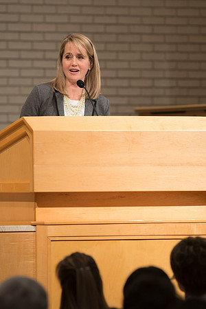 Sister GIlbert introduces Sister Bednar in A Gathering for Women in the Taylor Chapel.