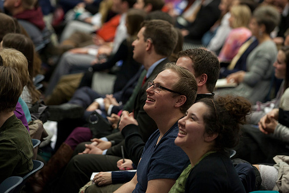 Students laugh at the remarks from The Bednar's. Photo by Tyler Rickenbach