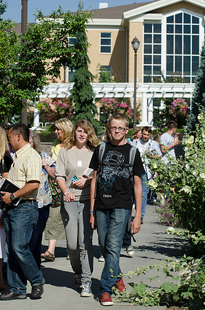 Participants of Education Week enjoy the Thomas E. Ricks Gardens on their way to get to their classes during Education Week 2013. Photo by Taylor Davenport