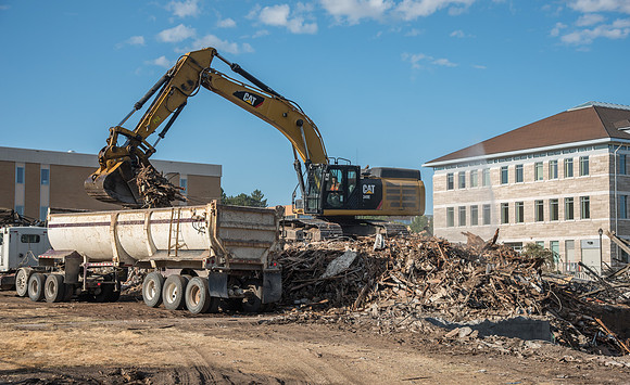 Remnants of the old Kirkham Building being hauled away.