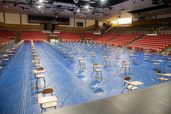 Desks in the Hart gymnasium set 6ft apart to practice physical distancing in efforts to fight the COVID-19 virus.