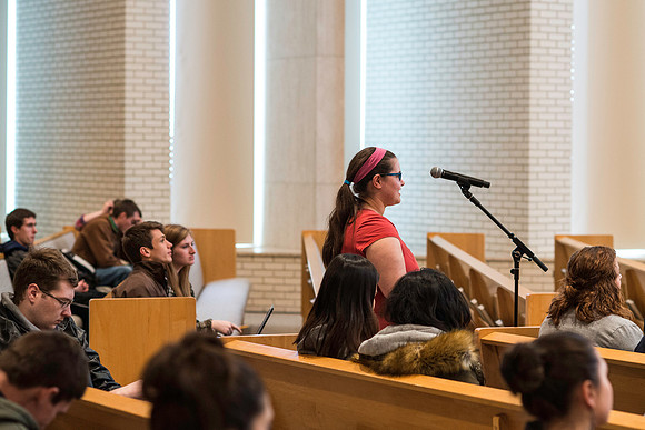 President Gilbert listens and answers questions from students during a Q&A.