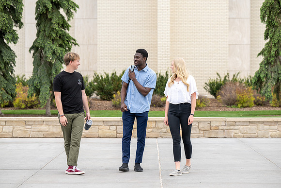 Student models for Admissions Viewbook cover options. May 2023
