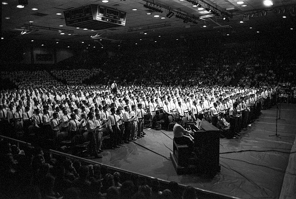 Men's Choir singing at devotional at Ricks College