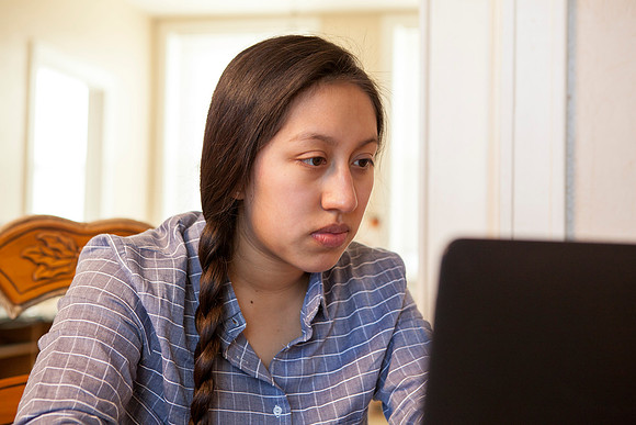 Tanya Rickenbach studies online at BYU-Idaho in her quiet apartment.