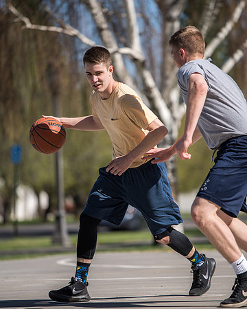 BYU-Idaho Admissions Viewbook. Jacob Kaiser playing basketball. Spring Semester