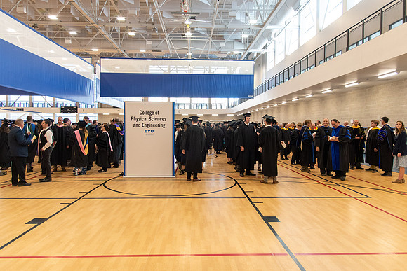 Student Graduates and Faculty meet in the I-Center for Commencement.