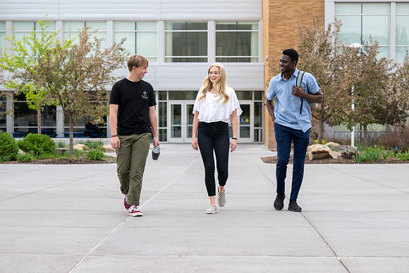 Student models for Admissions Viewbook cover options. May 2023