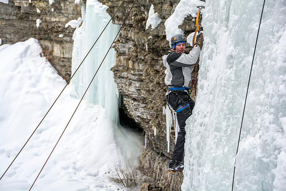 Student, Dana MItchell, a Recreation Management major, ice climbing as part of Outdoor Activities.