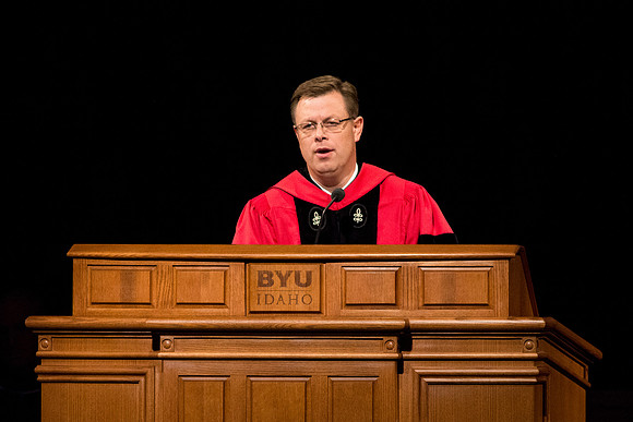 President Clark G. Gilbert giving a speech to the graduates at Commencement