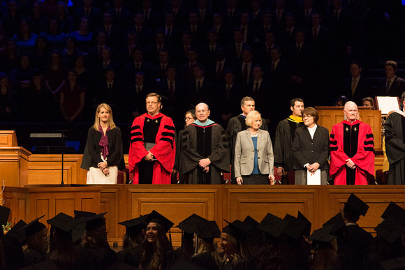 President Clark G. Gilbert, Elder Quentin L. Cook and Elder Kim B. Clark walking out in the graduation processional