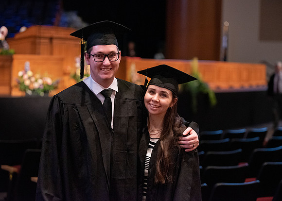 Student Graduates and Faculty meet in the I-Center for Commencement.