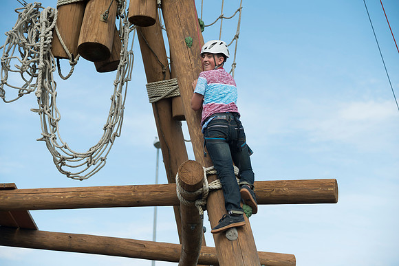 Youth high enjoy the Ropes Course class.