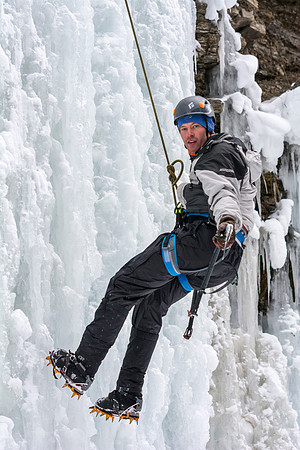 Student Dana MItchell, a Recreation Management major, ice climbing as part of Outdoor Activities.