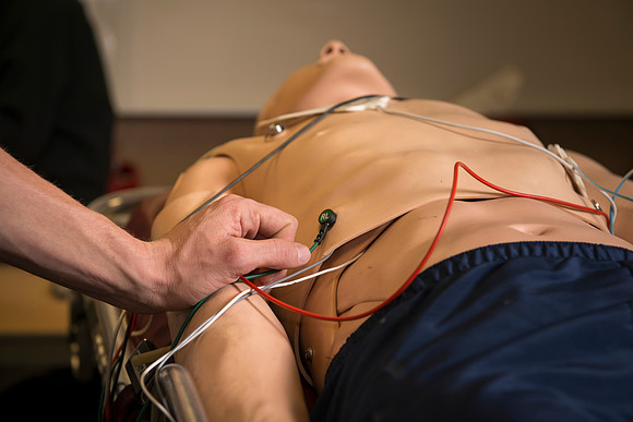 Cory Marriott and his peer pass off EMT requirements during lab held in the Clarke Building.
