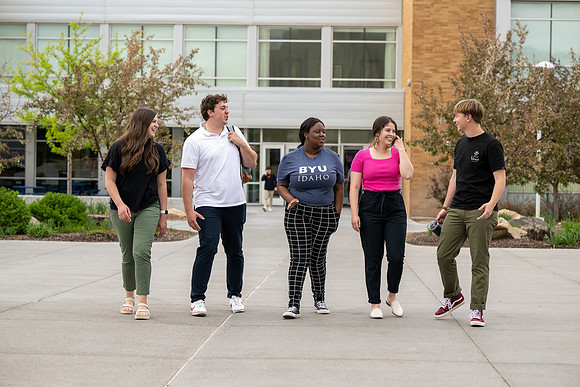 Student models for Admissions Viewbook cover options. May 2023