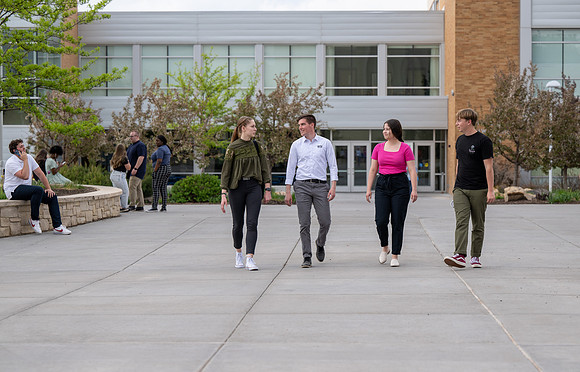 Student models for Admissions Viewbook cover options. May 2023