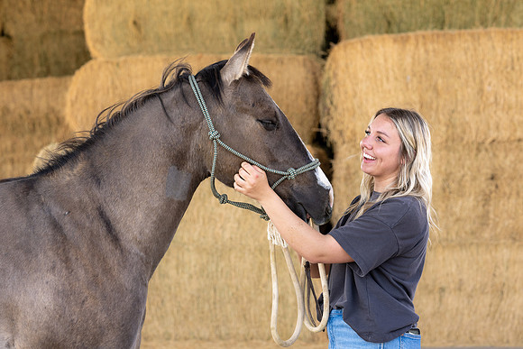 Rilie Vanderwiel, studying Animal Science, is right at home at the BYU-Idaho Animal Science Center.