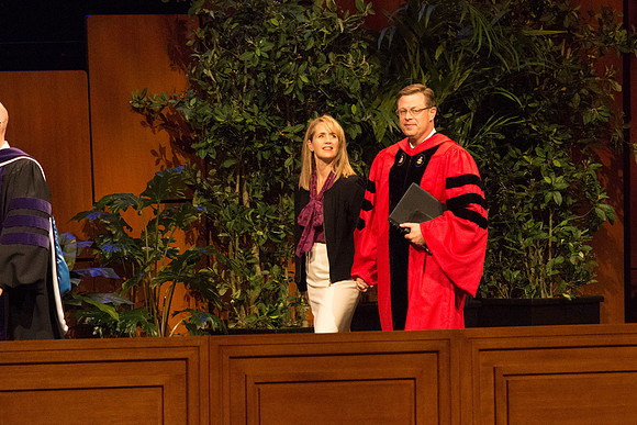 President Clark G. Gilbert and Elder Quentin L. Cook walking out in the graduation processional