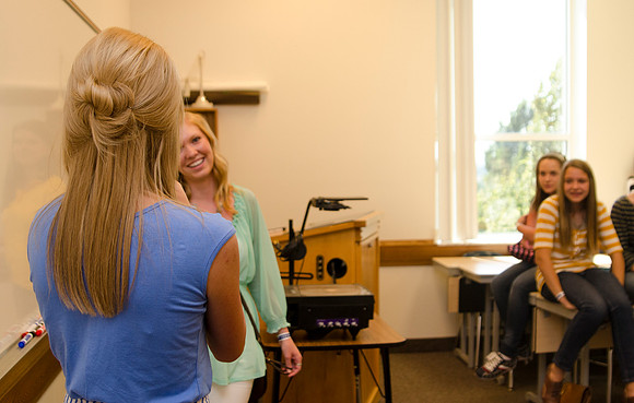 Participants in the Education Week 2013 Youth Program meet together in the Gordon B. Hinckley Building. Photo by Taylor Davenport
