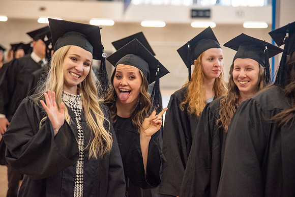 Student Graduates and Faculty meet in the I-Center for Commencement.