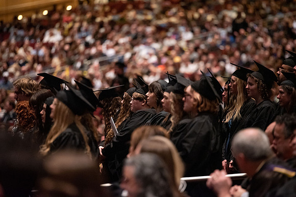 Student Graduates and Faculty meet in the I-Center for Commencement.