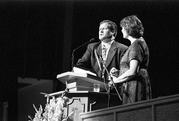 Brother and Sister Proctor speak to students at Ricks College during devotional