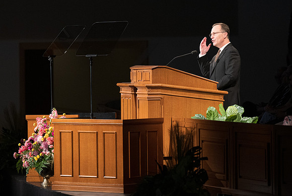 Students gather for devotional in the BYU-Idaho Center with Elder Kyle S McKay, General Authority Seventy.