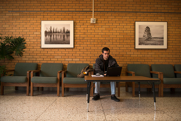 Alex Hernandex studies for finals on the third floor of the library.