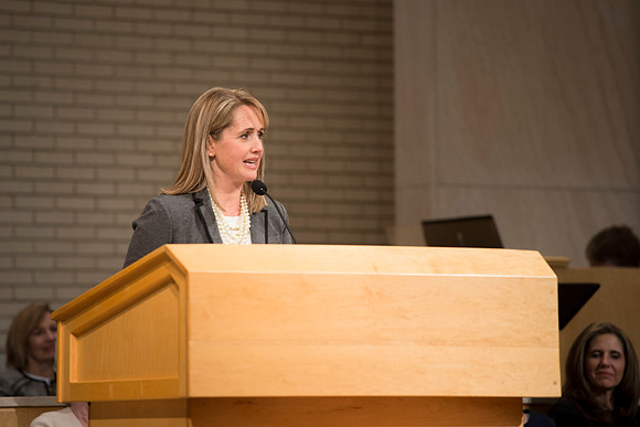 Sister GIlbert introduces Sister Bednar in A Gathering for Women in the Taylor Chapel.