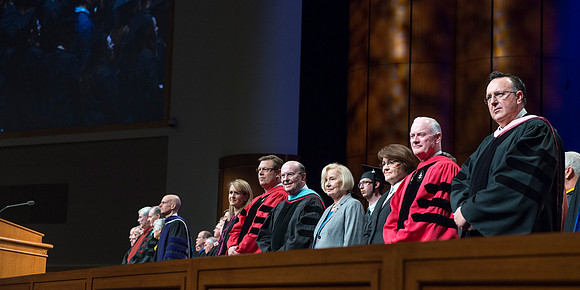 Graduates gather in the I-Center during the processional.