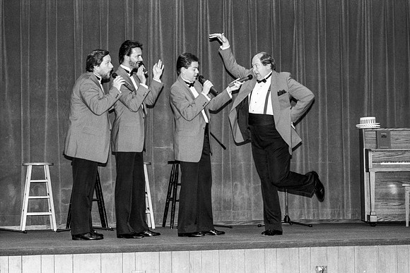The barbershop quartet sings a number at the Banquet