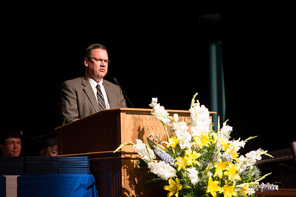 Alumni representative Rob Ahrendsen welcomes new gradutes into the Alumni Association. BYU-Idaho photos by Michael Lewis