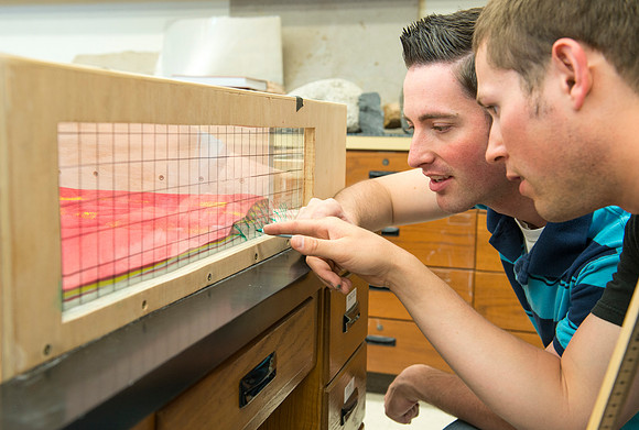 Jon Schmidt and Ryan Ronson work together on a Structural Geology Lab assignment: Analog modeling of thrust faults and compression.